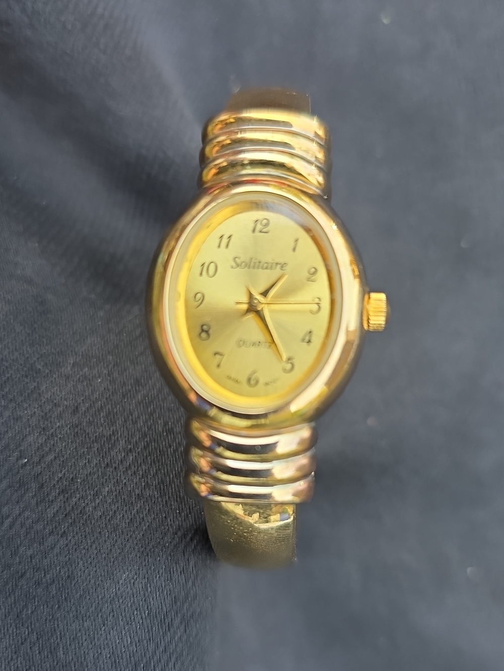 Elegant Solitaire Gold Tone Bangle Watch - Vintage Style